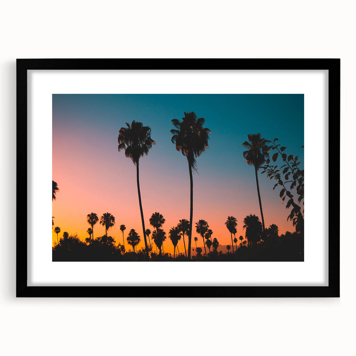 Extra large abstract art print of Los Angeles skyline in vibrant colors on textured canvas, framed in black.