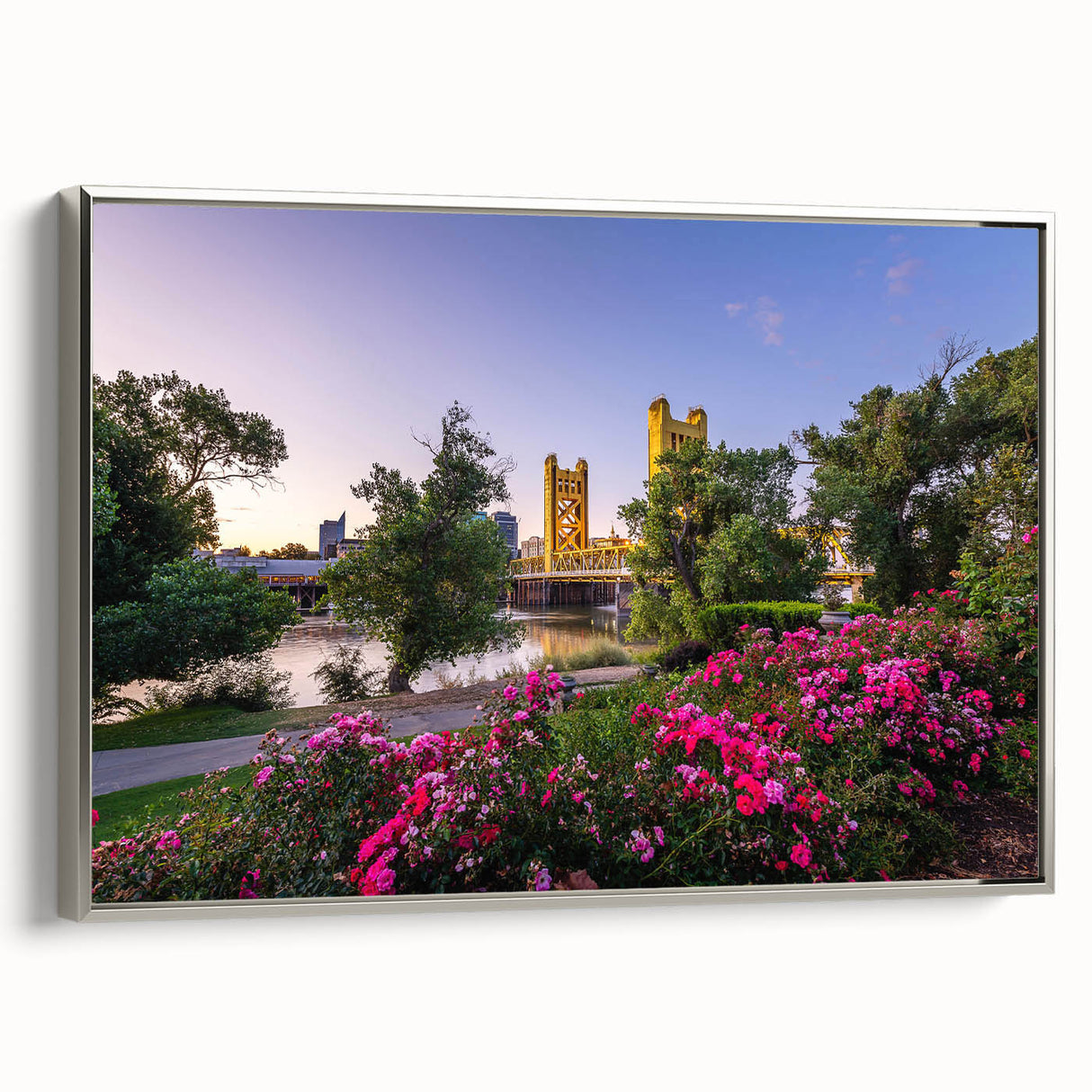 Framed canvas of Sacramento landscape with silver frame, featuring vintage-style colorful art on a black background.