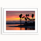 Abstract art print of San Diego skyline in muted blue and gray tones, framed with a white mat, ideal for dining room decor.