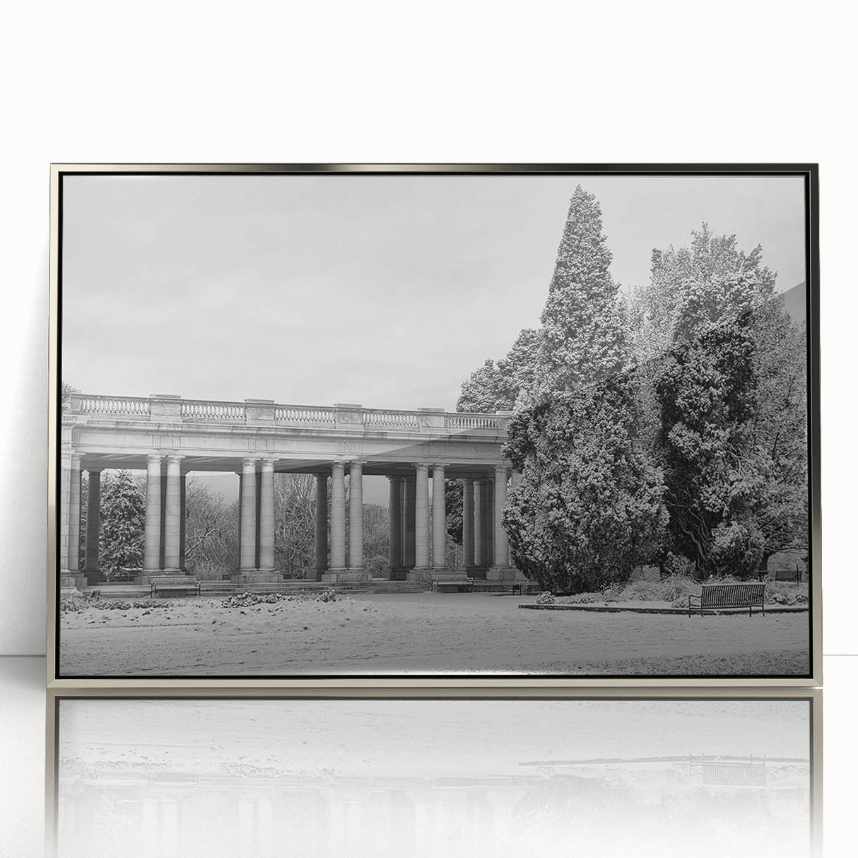 Mid-century modernist art depicting the Denver skyline in muted blue tones on a framed acrylic print.