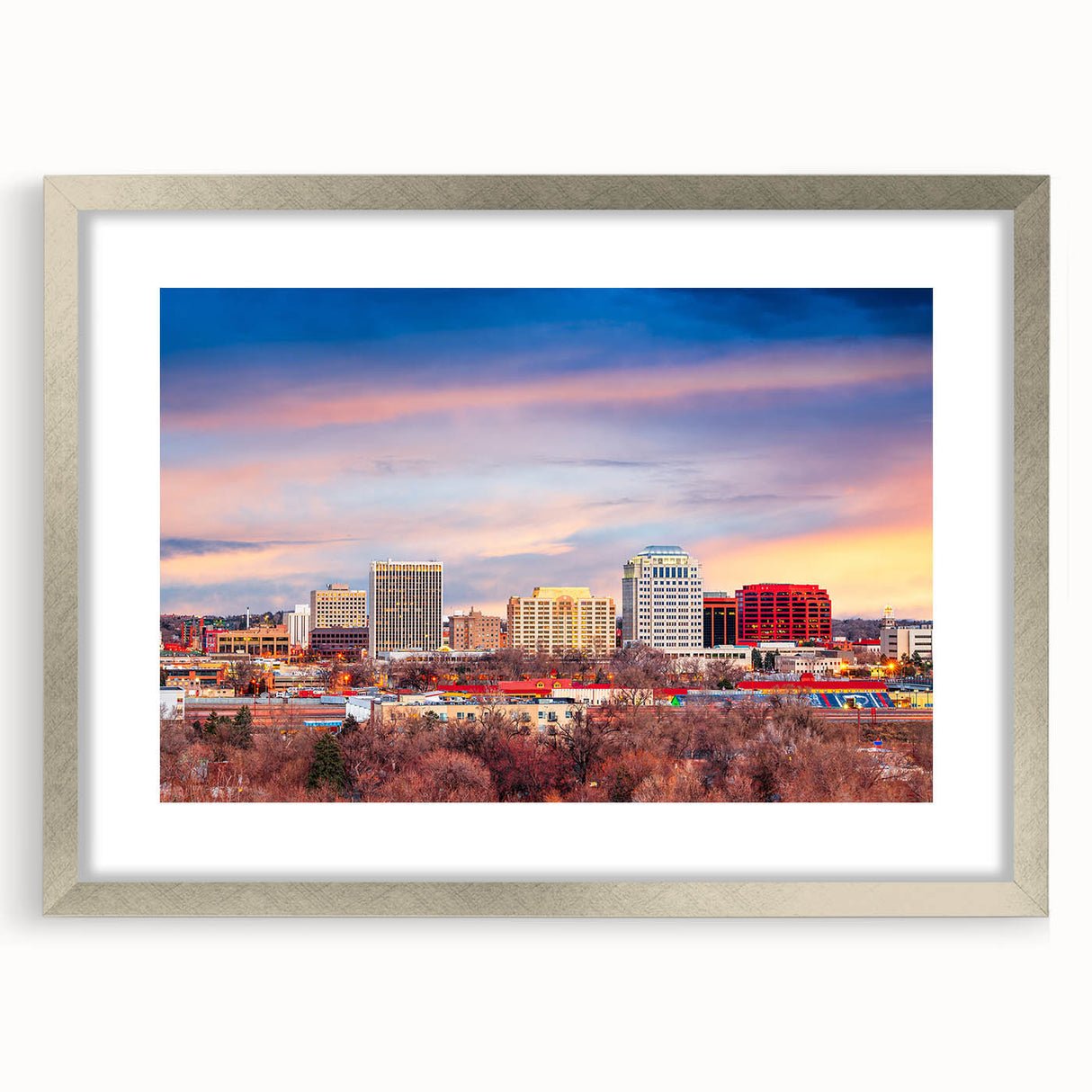 Textured abstract art print of Colorado Springs scenery in muted earth tones on a framed silver mat.