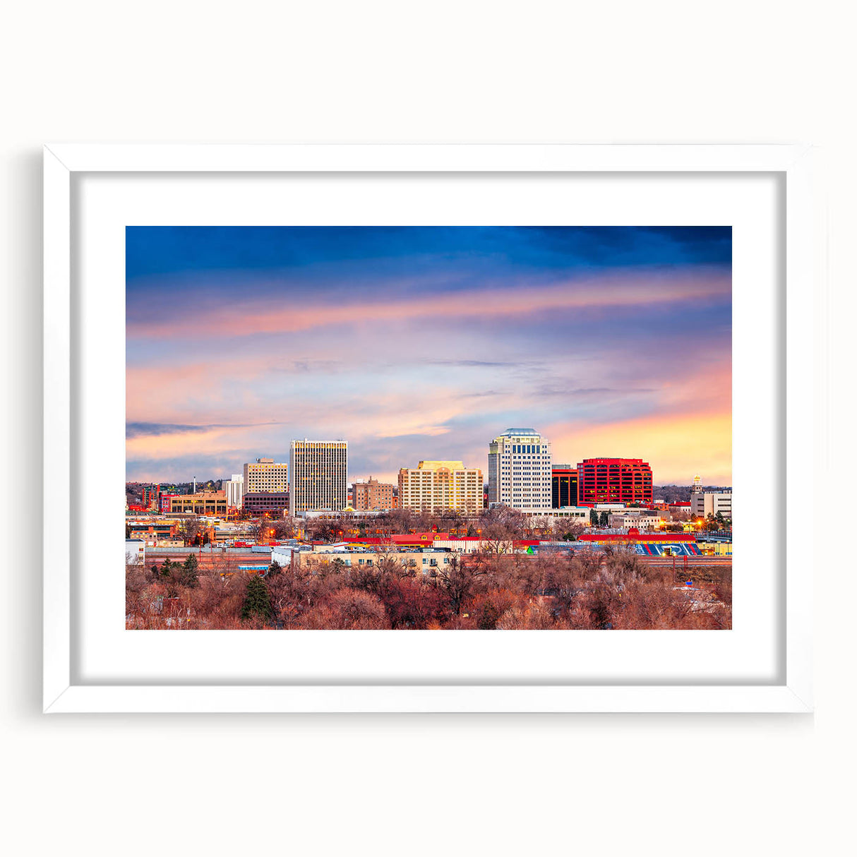 Abstract art print of Colorado Springs in muted earth tones on a framed white mat, ideal for dining room decor.