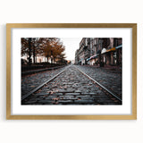 Extra large abstract art print of Savannah landscape in muted earth tones on a textured canvas, framed in gold.