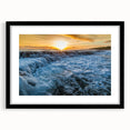 Colorful abstract art print of Kauai, Hawaii, in a black frame with mat, ideal for living room decor.