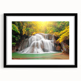 Textured abstract art print of vibrant, colorful scenery, framed in black, ideal for living room decor.