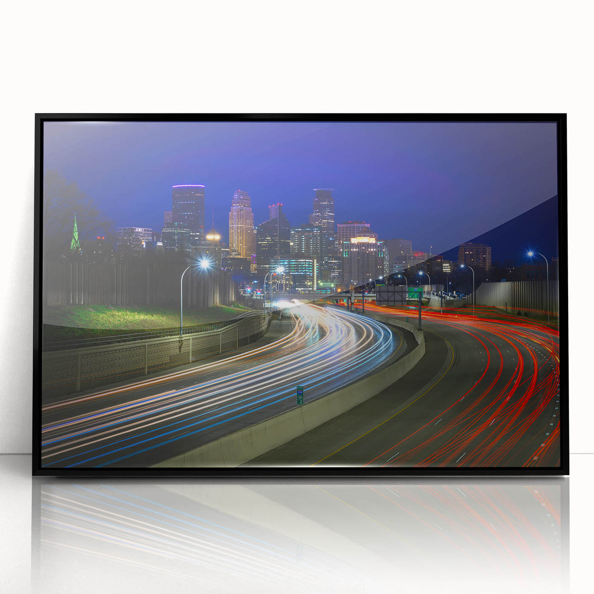 Large abstract wall art of Minneapolis skyline in muted gray and blue tones on a framed acrylic.