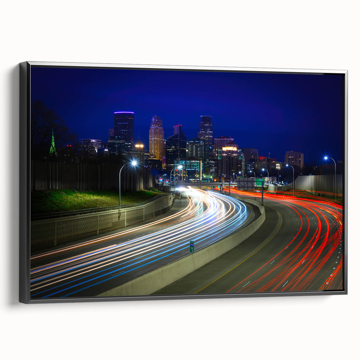 Black and white framed canvas of Minneapolis landscape, ideal for bedroom wall art with vintage poster style elements.