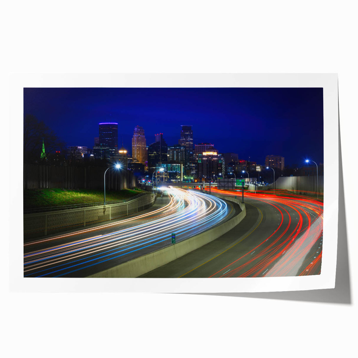 Extra large wall art depicting the Minneapolis skyline in muted gray and blue tones on a rolled canvas.