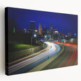 Large art print of Minneapolis skyline in muted blues and grays on stretched canvas, suitable for kitchen wall art.