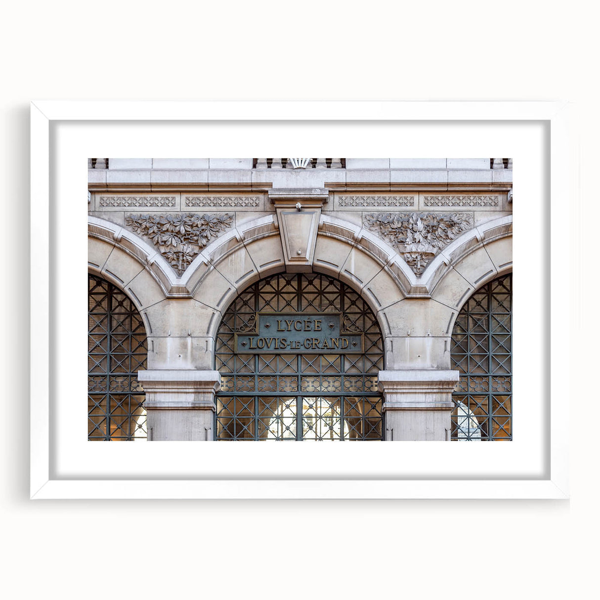 Abstract art print of St. Louis skyline in muted gray and blue tones on a framed white mat, ideal for dining room decor.