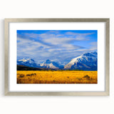 Textured abstract art print depicting a Montana landscape in muted earth tones on a framed silver mat.