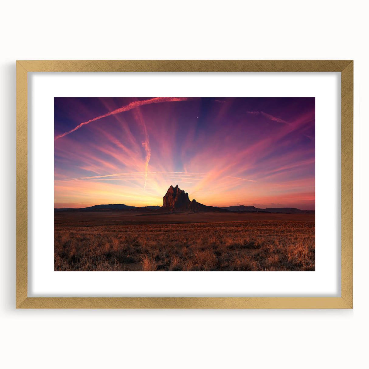 Extra large abstract art print of a textured New Mexico landscape in muted earth tones, framed in gold.