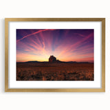 Extra large abstract art print of a textured New Mexico landscape in muted earth tones, framed in gold.