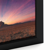 Extra large framed canvas of a textured New Mexico landscape in black with colorful art accents, ideal for living room decor.