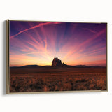 Framed canvas of a New Mexico landscape in vintage poster style, featuring muted earth tones, ideal for bedroom wall art.