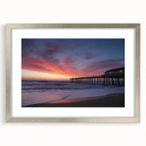Textured art depicting the Outer Banks, North Carolina in muted earth tones on a framed silver mat.