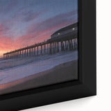 Framed canvas depicting a textured Outer Banks scene in black with colorful accents.