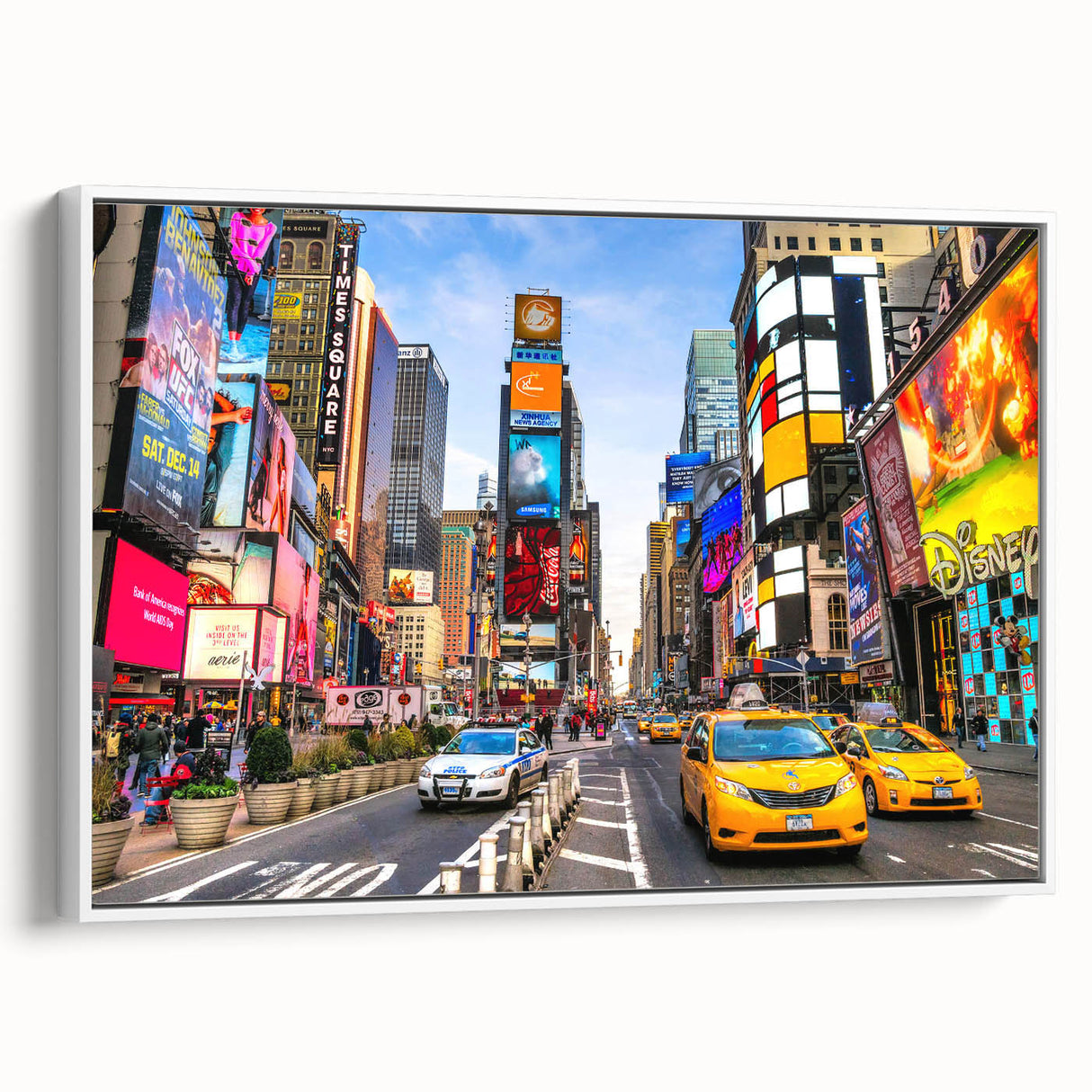 Vintage poster art of Manhattan skyline in vibrant colors on a white-framed canvas, suitable for large living room walls.
