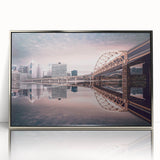 Mid-century modernist art of Pittsburgh skyline in silver framed acrylic, featuring muted gray and blue tones.