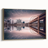 Framed canvas of Pittsburgh skyline with gold accents, featuring vintage poster style, ideal for bedroom wall art.