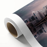 Art Deco style poster of Pittsburgh skyline in muted gold and blue tones on rolled canvas.