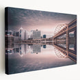 Panoramic view of Pittsburgh skyline in muted blue and grey tones on a large stretched canvas, suitable for kitchen wall art.