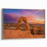 Landscape art painting of Utah Arches on a silver-framed canvas, featuring earthy red and orange tones.