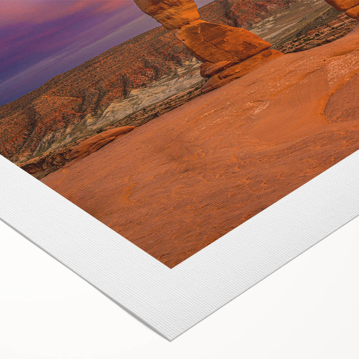 Art deco poster of Arches National Park in muted earth tones on rolled canvas, suitable for dining room decor.