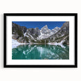 Colorful abstract depiction of the Grand Tetons on a textured, extra large canvas, framed in black.
