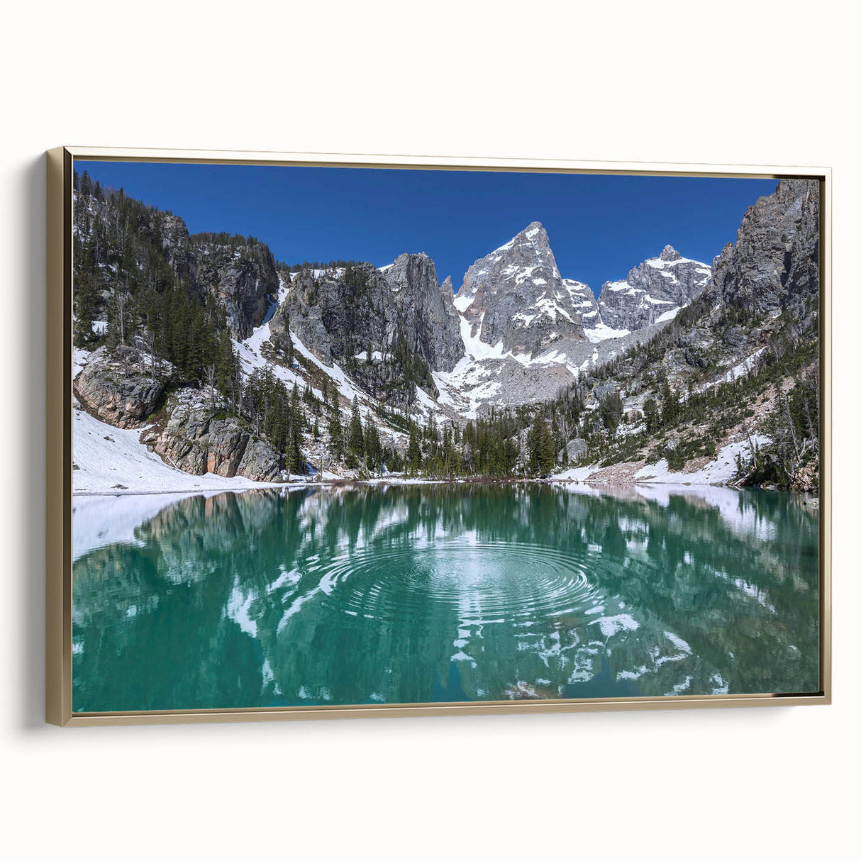 Framed canvas depicting the Grand Tetons in muted earth tones, suitable as wall art for bedrooms.