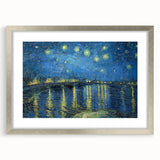 Textured abstract art print in vibrant blue and yellow tones, framed in silver, suitable for bedroom decor.