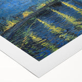 Art deco poster of a starry night over a village, in deep blue and yellow tones, on rolled canvas.