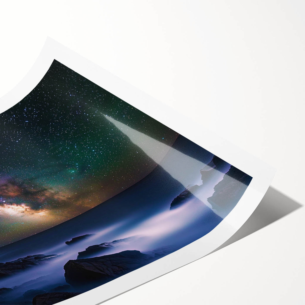 Stunning rolled print of a dramatic landscape featuring towering cliffs and a vibrant sunset, packaged securely in a protective cardboard tube for safe shipping.