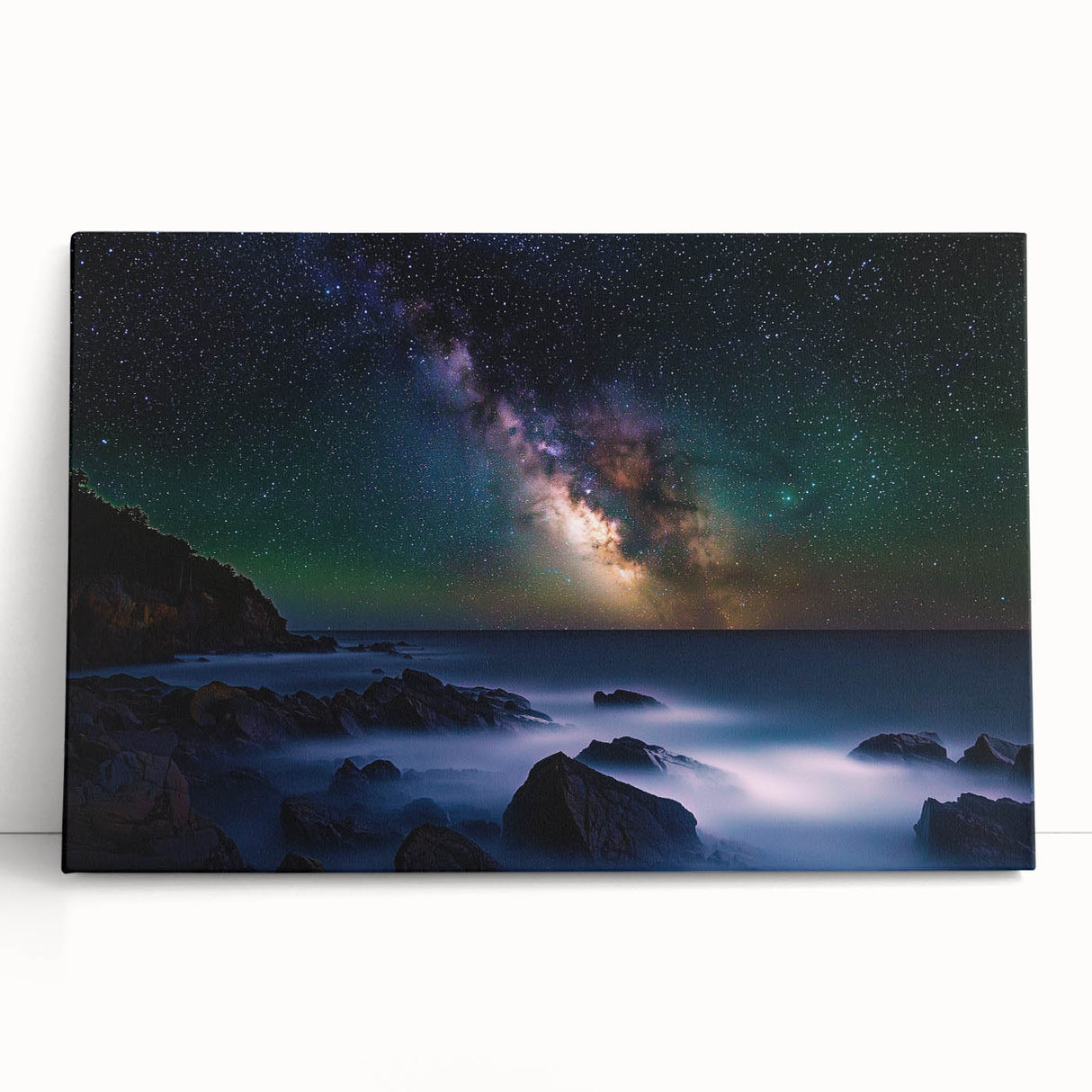 Stretched canvas artwork depicting a dramatic landscape of cliffs under a vibrant sunset sky, perfect for adding a serene touch to home decor.