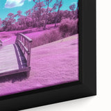 Close-up of a framed canvas print depicting a serene landscape bridge scene, showcasing vibrant colors and intricate details, ideal for home decor or art enthusiasts.