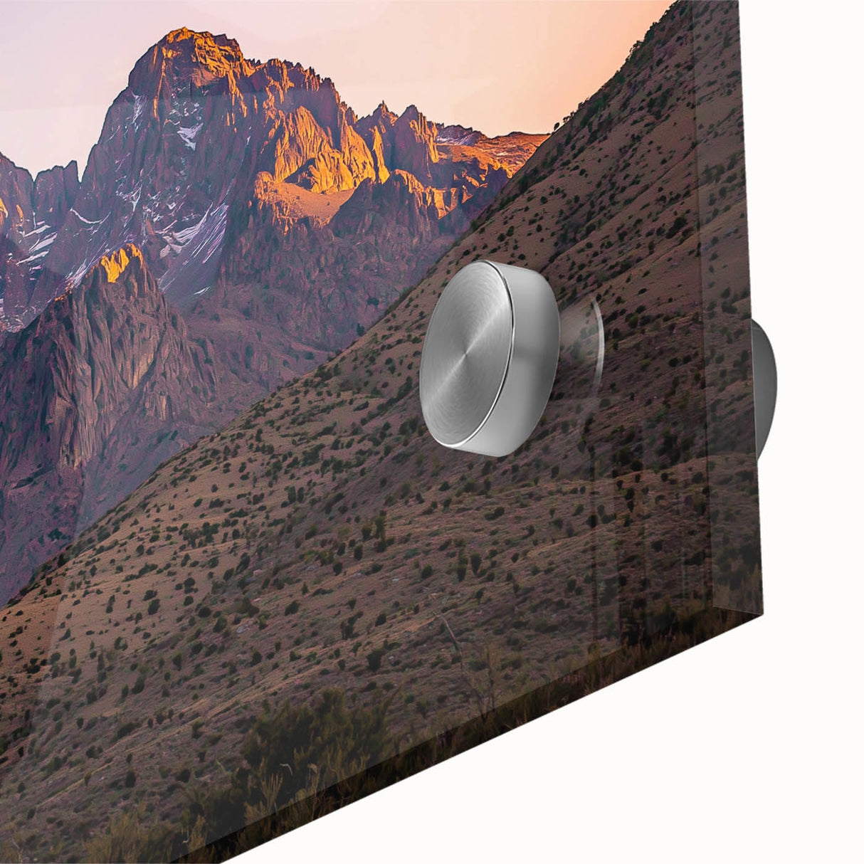 Close-up of an acrylic glass artwork depicting dramatic cliffs and vibrant landscapes, showcasing intricate details and rich colors, perfect for modern decor.