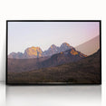 Framed acrylic artwork showcasing a stunning landscape of cliffs in vibrant colors, featuring a sleek black frame, ideal for enhancing modern home decor.