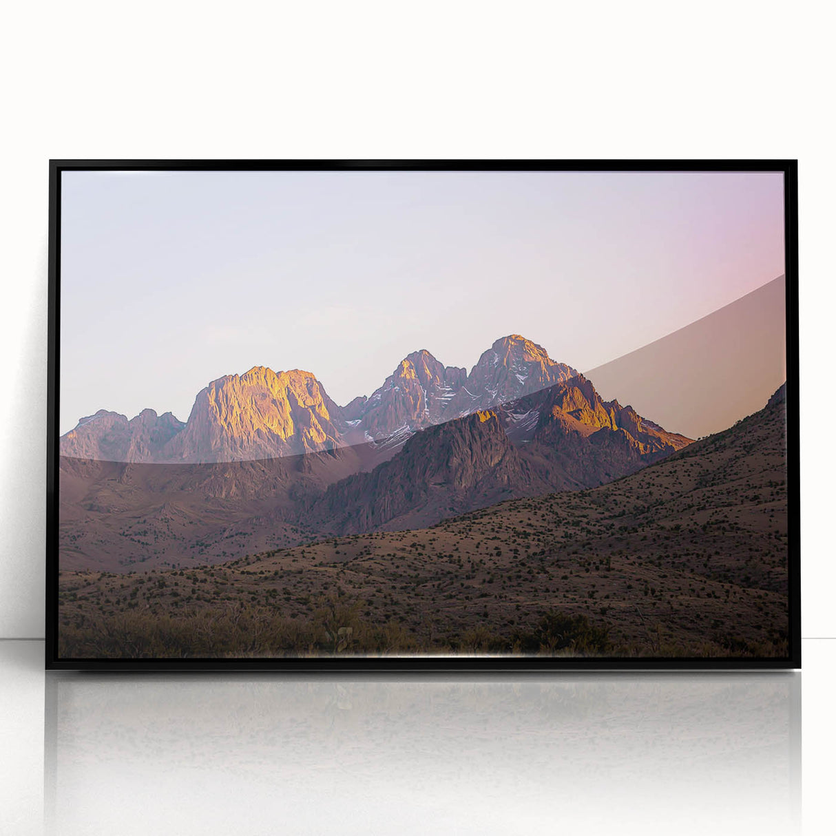 Framed acrylic artwork showcasing a stunning landscape of cliffs in vibrant colors, featuring a sleek black frame, ideal for enhancing modern home decor.