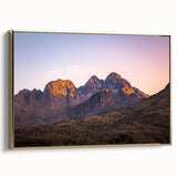 Framed canvas artwork depicting a breathtaking landscape with cliffs, featuring a gold frame that enhances the natural beauty of the scene, ideal for home decor.
