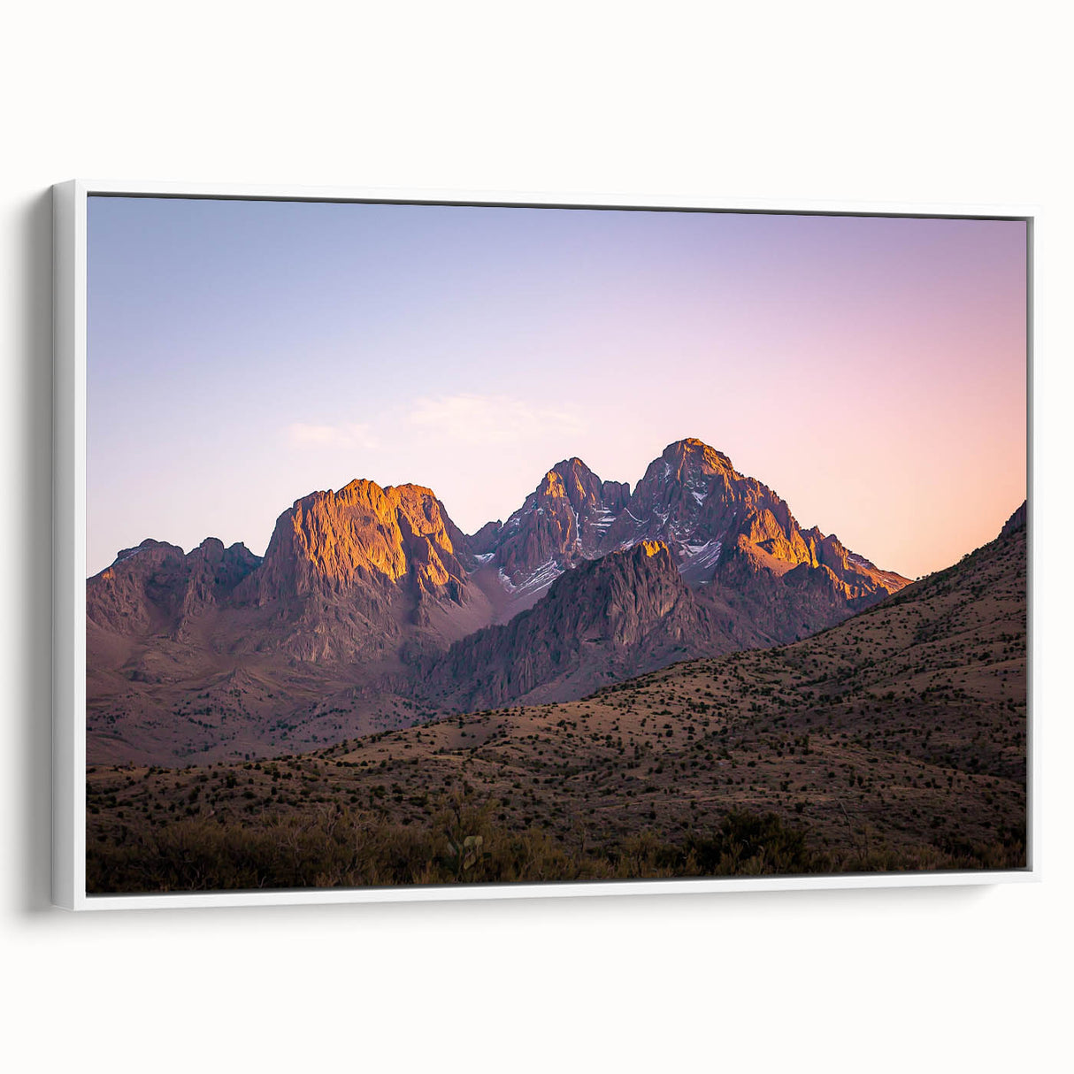 Framed canvas artwork depicting a scenic cliff landscape with vibrant colors, set against a white background, showcasing a modern home decor style. Ideal for nature enthusiasts and art lovers.