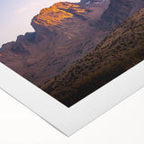 Vibrant rolled canvas showcasing a stunning landscape of cliffs under a clear blue sky, ideal for home decor, art collectors, and nature enthusiasts.