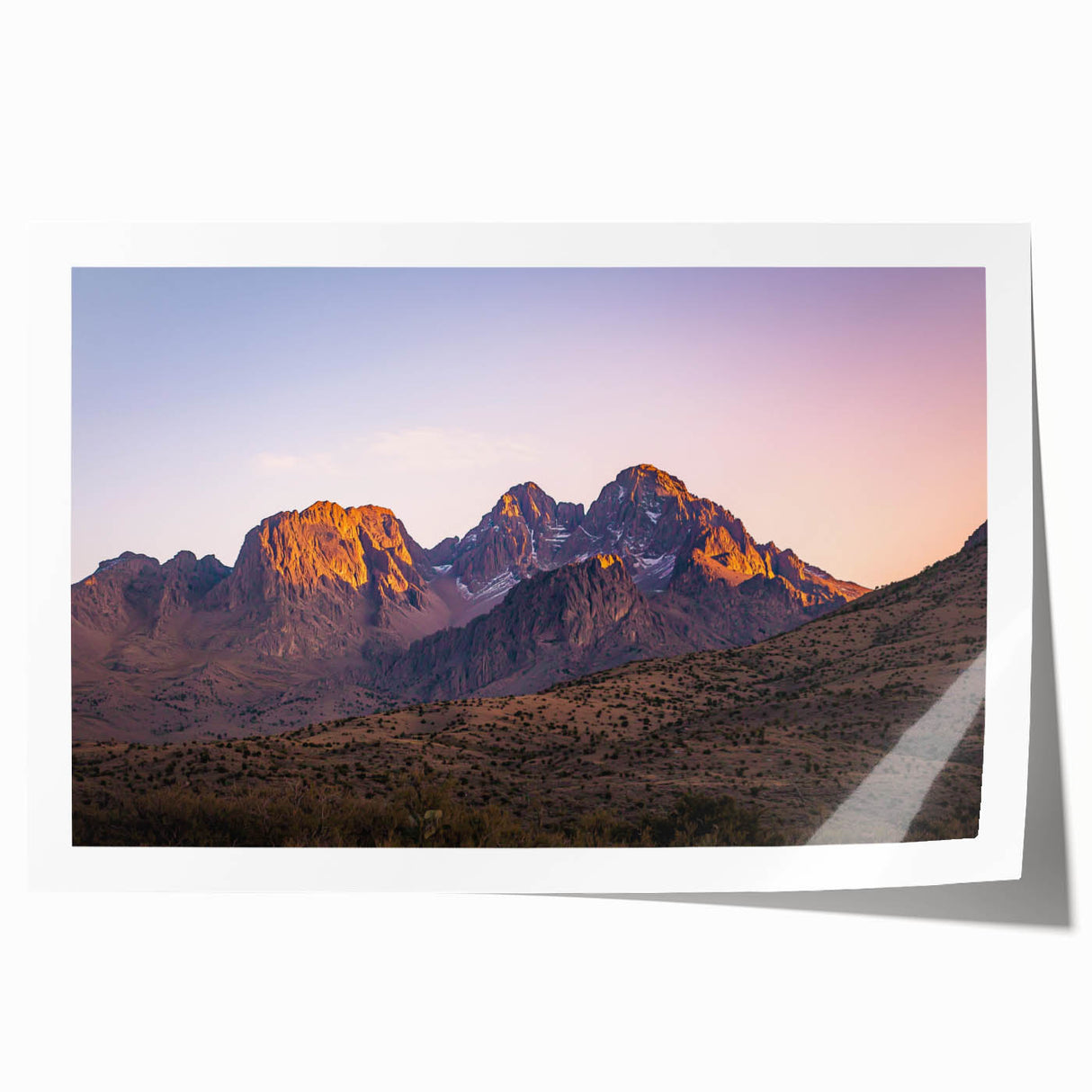 Vibrant rolled print showcasing a dramatic cliff landscape with rich colors and intricate details, ideal for enhancing home decor and creating a serene atmosphere.