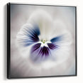 Framed abstract floral wall art in vibrant colors, showcasing a black and white design, displayed from the side to highlight its depth and texture. Perfect for modern home decor.