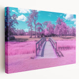 Side view of a stretched canvas showcasing a vibrant landscape bridge scene, featuring lush greenery and a clear blue sky, ideal for home decor.