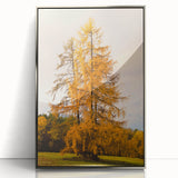 Mid-century modernist art depicting autumn trees in orange and brown hues on a silver-framed acrylic print.