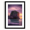 Black-framed landscape artwork featuring dramatic cliffs and serene ocean views, with a stylish mat for an elegant presentation, perfect for home decor.