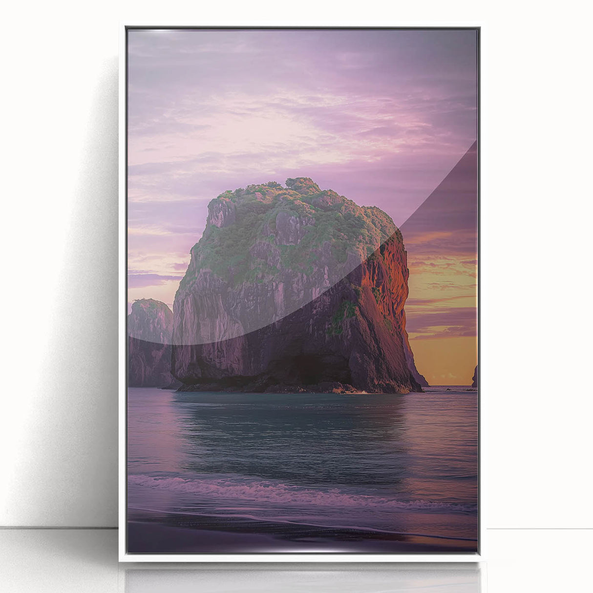 Framed acrylic artwork depicting a stunning landscape of cliffs under a vibrant sky, featuring a white frame that enhances its modern aesthetic appeal.