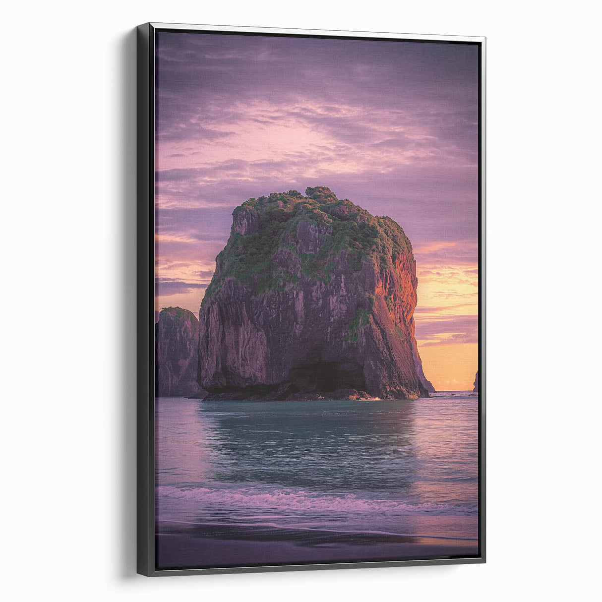 Framed canvas artwork showcasing a dramatic cliff landscape, featuring vibrant colors and detailed textures, displayed against a sleek black frame. Perfect for modern home decor.