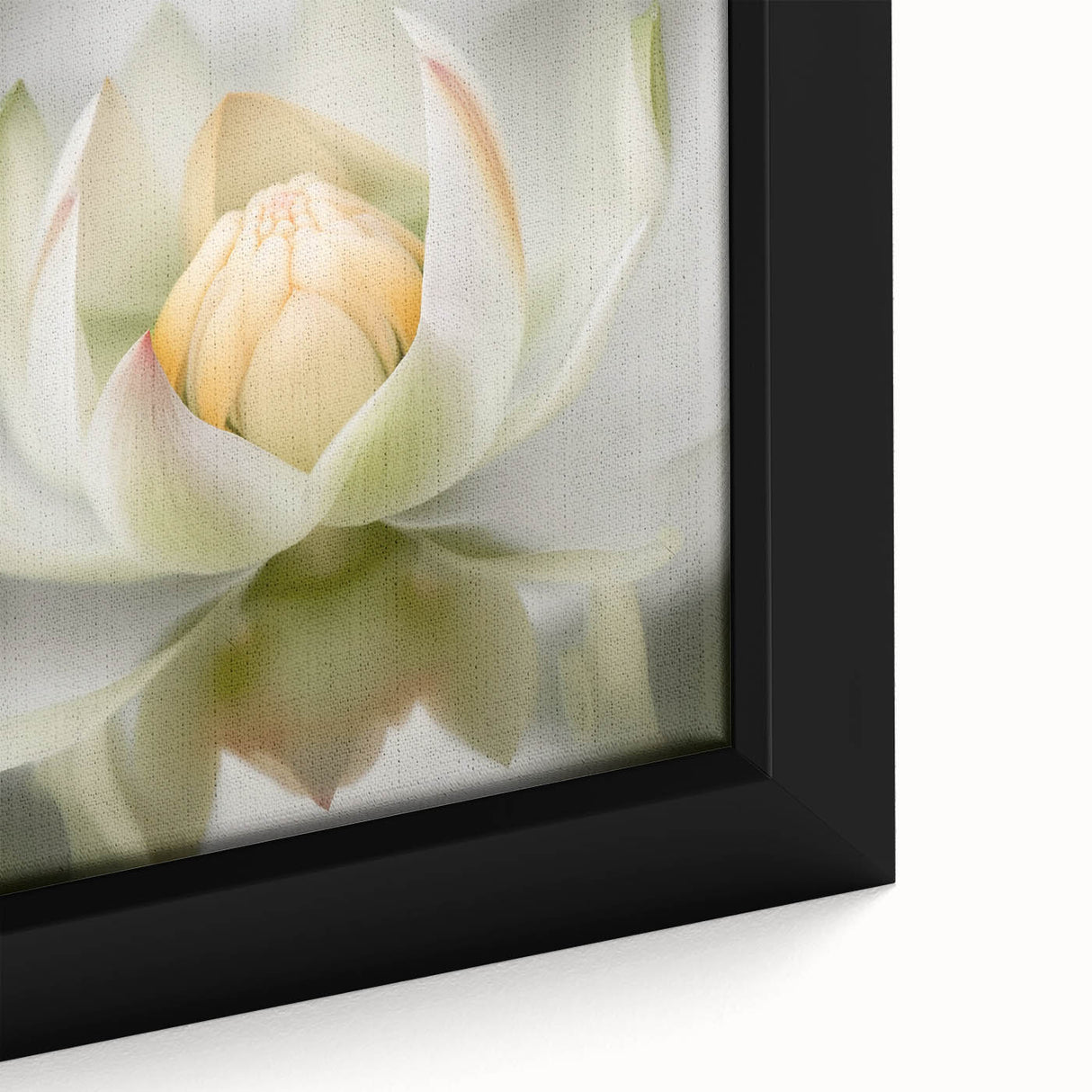 Close-up of a framed canvas artwork showcasing vibrant abstract floral designs in shades of pink, green, and blue, perfect for modern home decor.