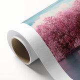 Rolled canvas showcasing a vibrant landscape bridge design with intricate details and rich colors, securely packaged in a durable cardboard tube for easy transport and protection.